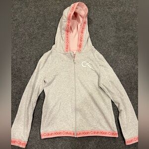Calvin Klein Long Sleeve shirt on a zipper with a hood size 12/14 girls